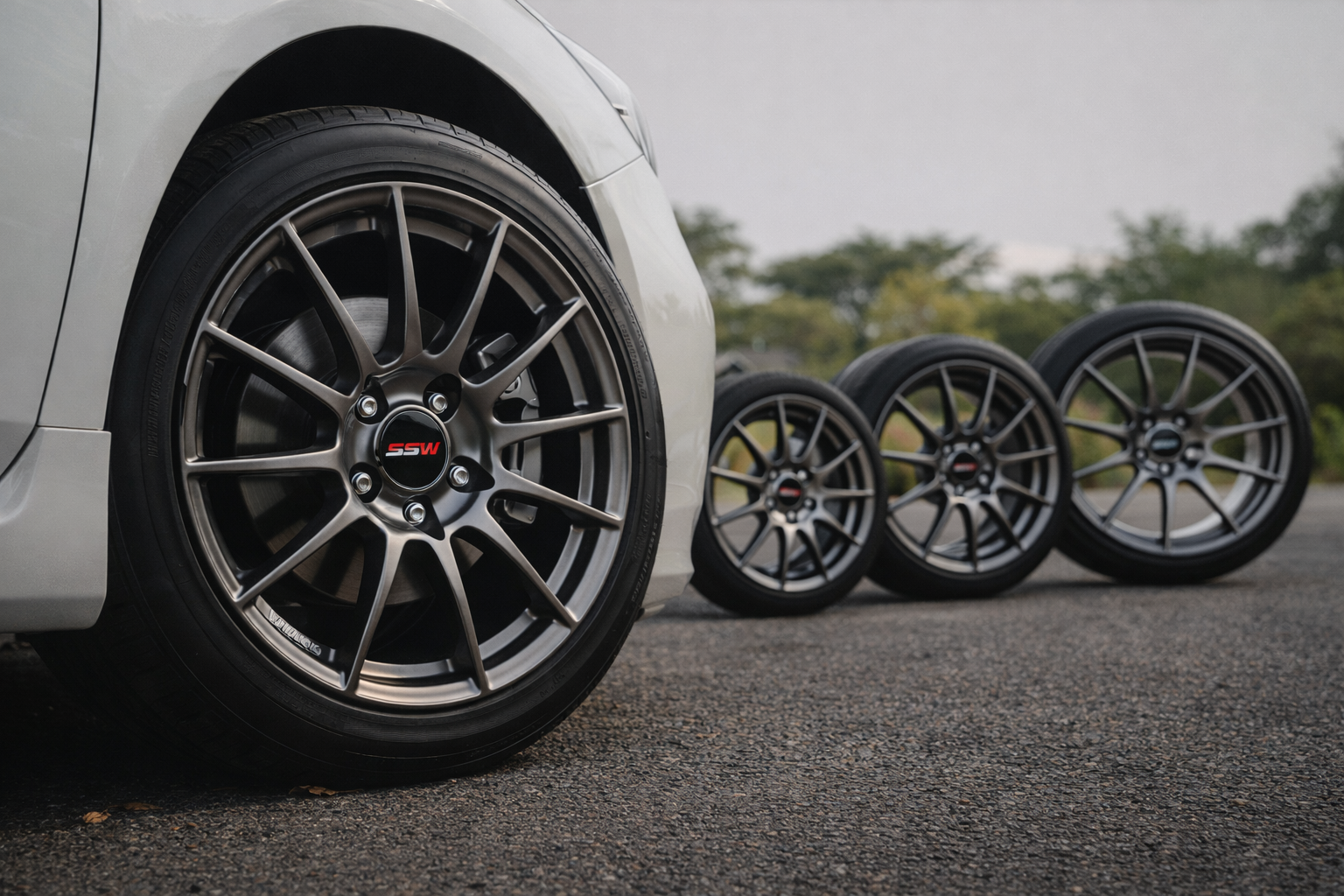 SSW alloy wheels fitted on a car with multiple SSW performance wheels lined up, showcasing wheel size, spoke design, and sporty fitment
